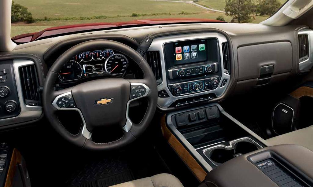 Silverado 2500HD Crew Cab LTZ interior in Dune with perforated leather appointments and Cocoa interior accents and available features. 1 Visit onstar.