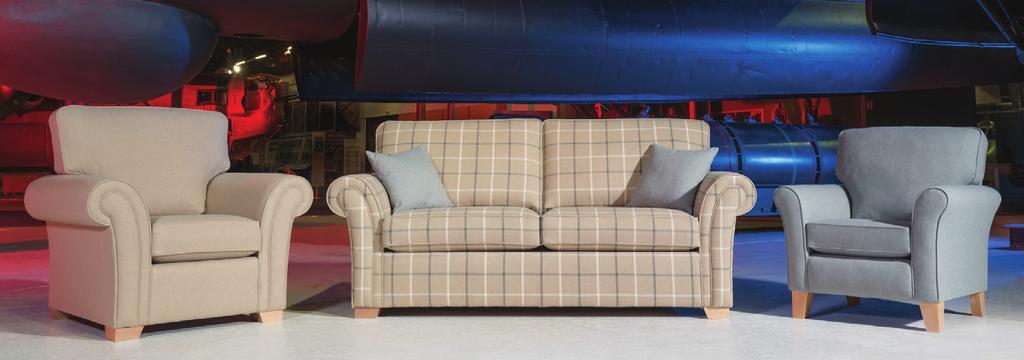 Chair in fabric 7968, light feet. 3 seater sofa/sofabed in fabric 7888, small scatter cushions in 7966, light feet.
