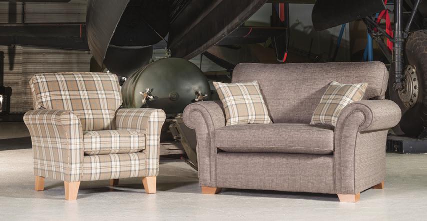 2 seater sofa/sofabed in fabric 7695, small scatter cushions in 7126, light feet.