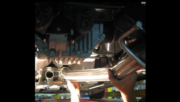car. The factory sub-frame braces can also be reinstalled at this time. Torque the bolts to 18 ft-lbs.