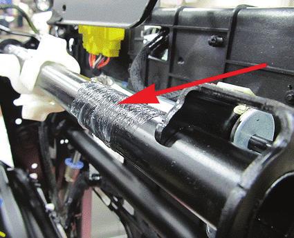 The front seat cushion condition may be caused by movement between the seat pan front pivot points and the seat frame, or the seat spring rear mounting hooks where they attach to the seat frame.