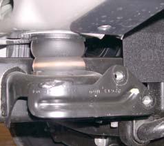 Passenger Side: Remove two bolts from bumper bracket and frame. Remove bumper and bumper bracket from vehicle.