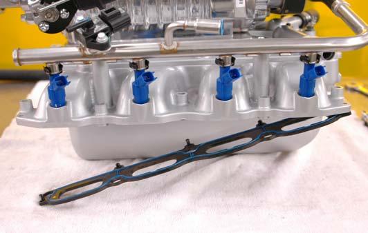 intercooler barb as shown. Secure the hose with the #10 clamp supplied. 60 Hose 72.