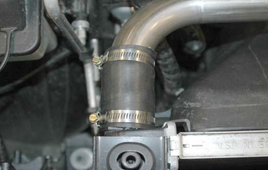 Tighten all four bolts and torque them to 106 in-lbs (12Nm). 98.