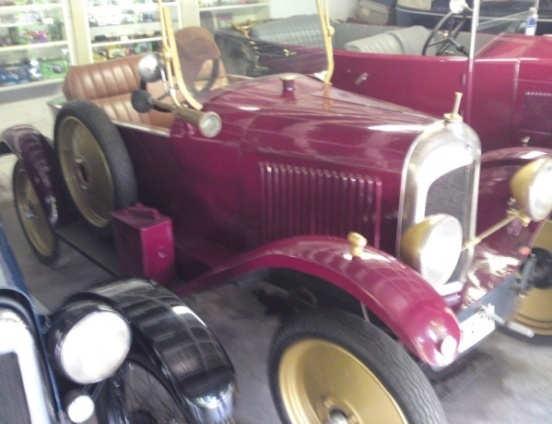 The crimson roadster (above) has been in the same family since the 1940 s and has been preserved in Midrand for decades.
