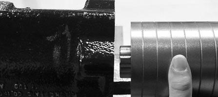 IPRTANT: The sector shaft seal is a two piece seal. It will necessary to bend the seal for installation.