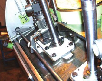 New roller guide design (2006) mounted in bushes that are shrinkfitted directly into in the engine frame steered by a pin on the roller guide stud and a groove in the bushes.