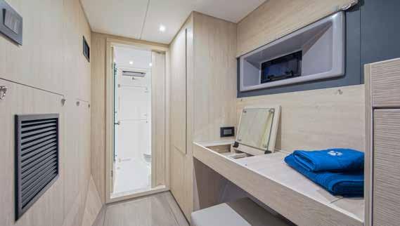 The starboard hull is entirely dedicated to the luxurious owner s suite with a spacious master cabin aft, a vanity table/desk, multiple