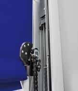 Subsequently, the door curtain can slip out of the door frame guides in any direction. After the manual operation of the control, the door moves downwards into the closed position.