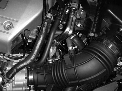 e) Disconnect the air injection line and the engine