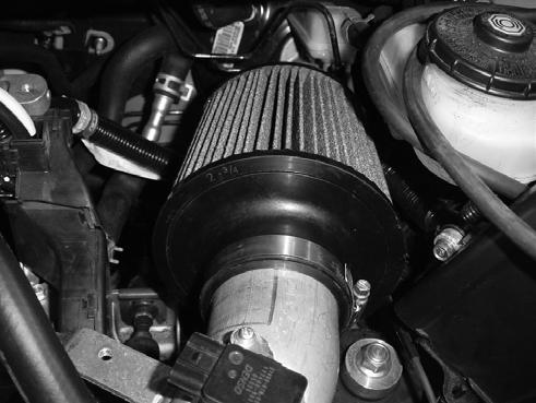 g) Slip the air filter onto the intake pipe and tighten the hose clamp.
