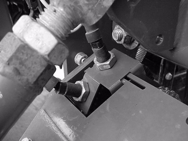 Installation Instructions 5 Refer to Figure 9 14. Install speed sensor on sensor U-mount bracket on the left-hand gauge wheel. Adjust to within.030 clearance of sensor disk and snugly tighten jam nut.