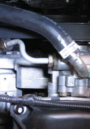 Supercharger Bracket SUPERCHARGER BRACKET Power Steering Hose 1 With an 18mm wrench, loosen the