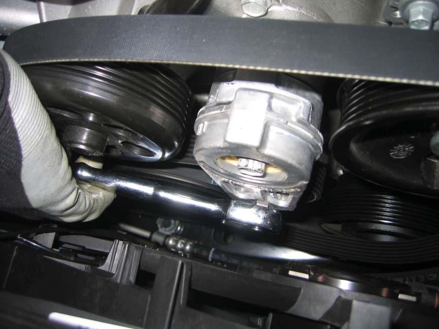Supercharger Bracket Tensioner and Belt 1 Remove the serpentine belt.