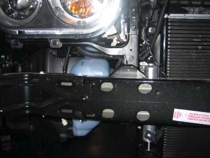 2 Remove the eight (four on each side of the vehicle) 13mm bolts securing the front bumper to the vehicle. Front Bumper Bolt Locations (Pass.