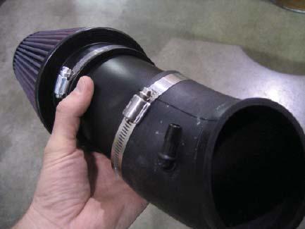 Finishing Air Inlet 1 Drill a 1/2 hole in the rubber inlet elbow. Refer to the image on the right for proper placement.