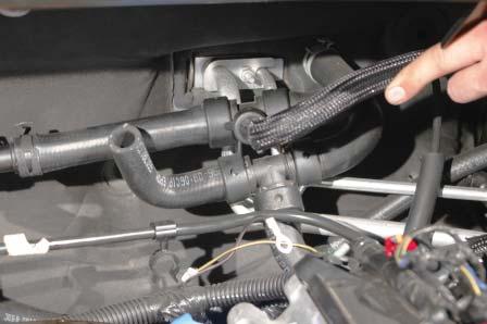 48. Cut the heater hose that went to the hard line on the driver side below the OEM manifold after the fi rst 90