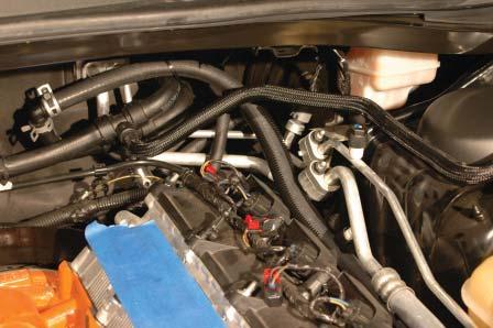 Use the provided split loom and zip ties to protect the driver side heater hose from any potential chaffi ng points (as you did with the passenger