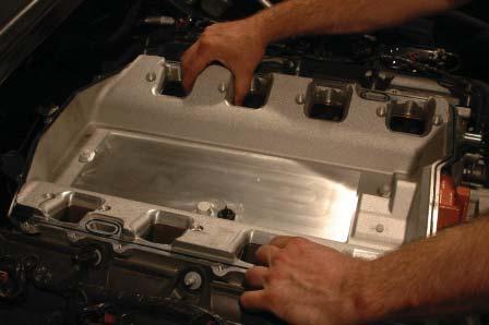 Carefully place the supercharger tub over the OEM gaskets on the heads, verify your port