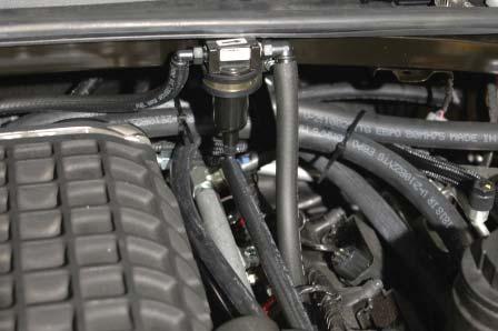 Connect the passenger side PCV hose to the oil separator valve on