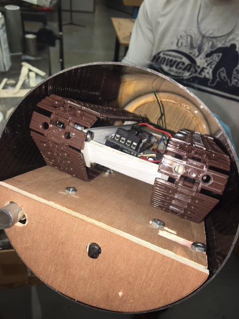 The deployment system uses various materials. The rover plate is made from of 3/16 plywood. This allowed for ease of bolting the linear actuators down to the plate.