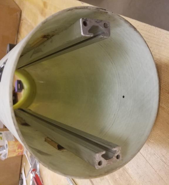 end of the body tube and the other mated against the coupler.