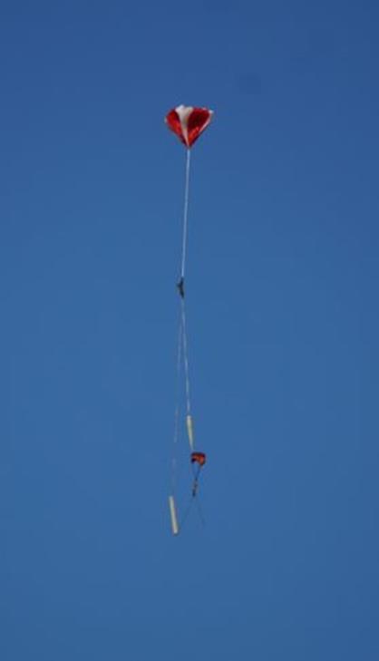 The main parachute was programmed to eject from the nose cone section at 1100 ft. The black powder charge successfully decoupled the nose and aft.