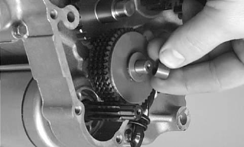 Place a thrust washer onto the crankshaft; then