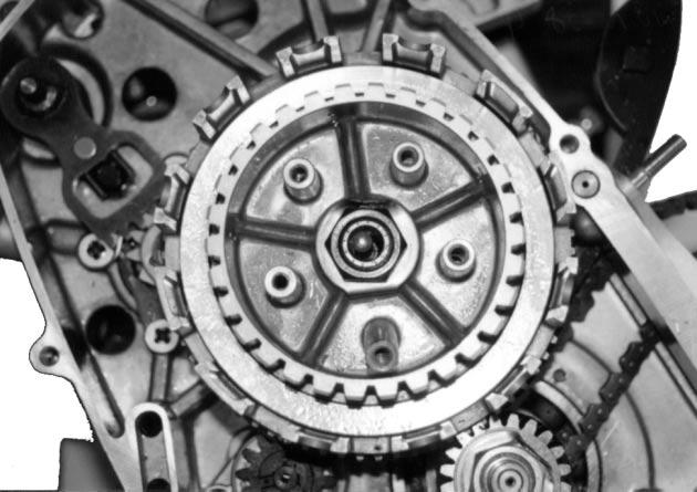 3-15 ENGINE CLUTCH With the primary drive gear held