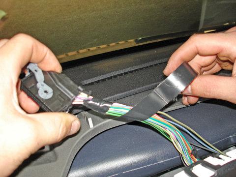 9. Wrap the gauge cluster harness with electrical tape as shown