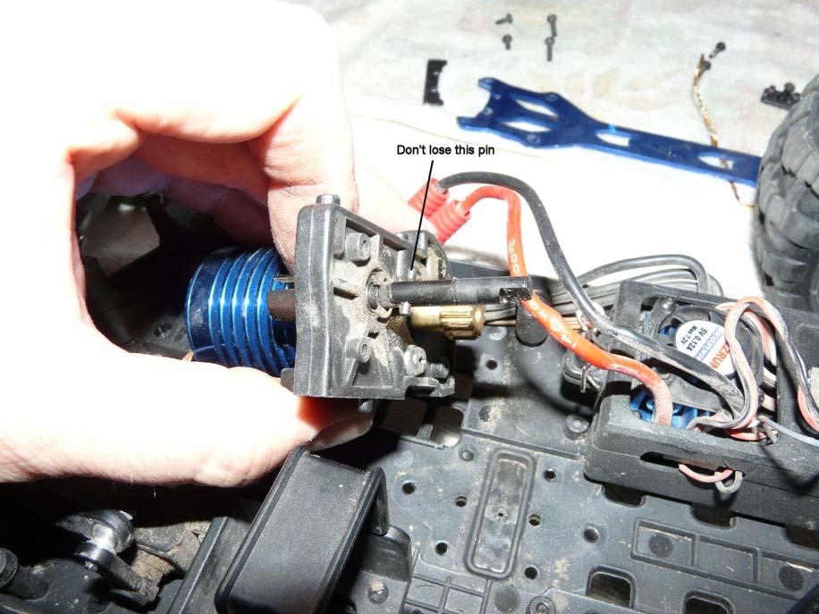 Once E-Clip is removed, you can pull the stripped spur gear off, taking care not to
