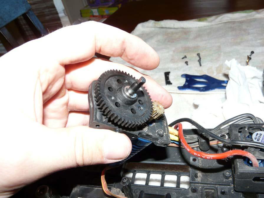 Once new spur gear is in place, put the E-Clip back on, carefully.