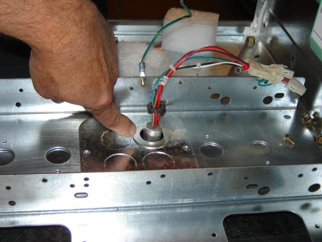 Reinstall the upper conduit knockout plate to the cd module using (2) screws.