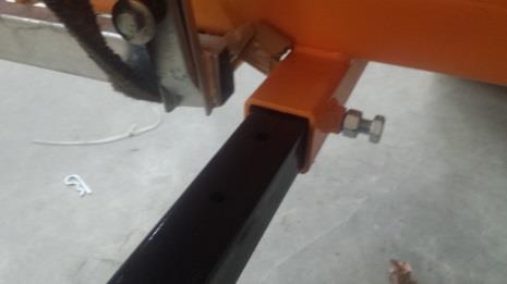 ) Slide Axle through tube, make sure the bolt