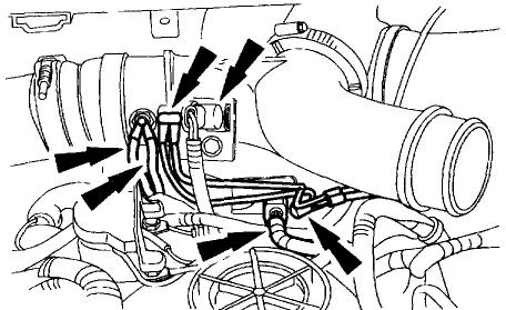 Label and disconnect the intake air heater element electrical leads, intake air temperature