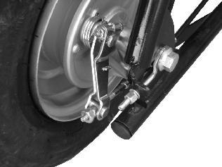 16 in) 2 1 3 Brake Adjustment The brake adjustment nut (4) is located on the rear brake drum assembly (5) located on the rear wheel To adjust brakes, turn the adjusting nut (4) clockwise to increase