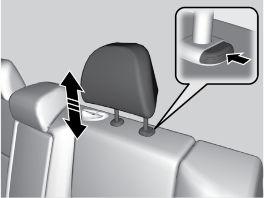 VEHICLE CONTROLS VEHICLE CONTROLS Adjusting the Rear Head Restraints To raise the head restraint: Pull it upward. To lower the head restraint: Push it down while pressing the release button.