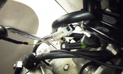 F 12 Plug the pair of PCV wiring harness leads with BROWN colored wires in-line of the