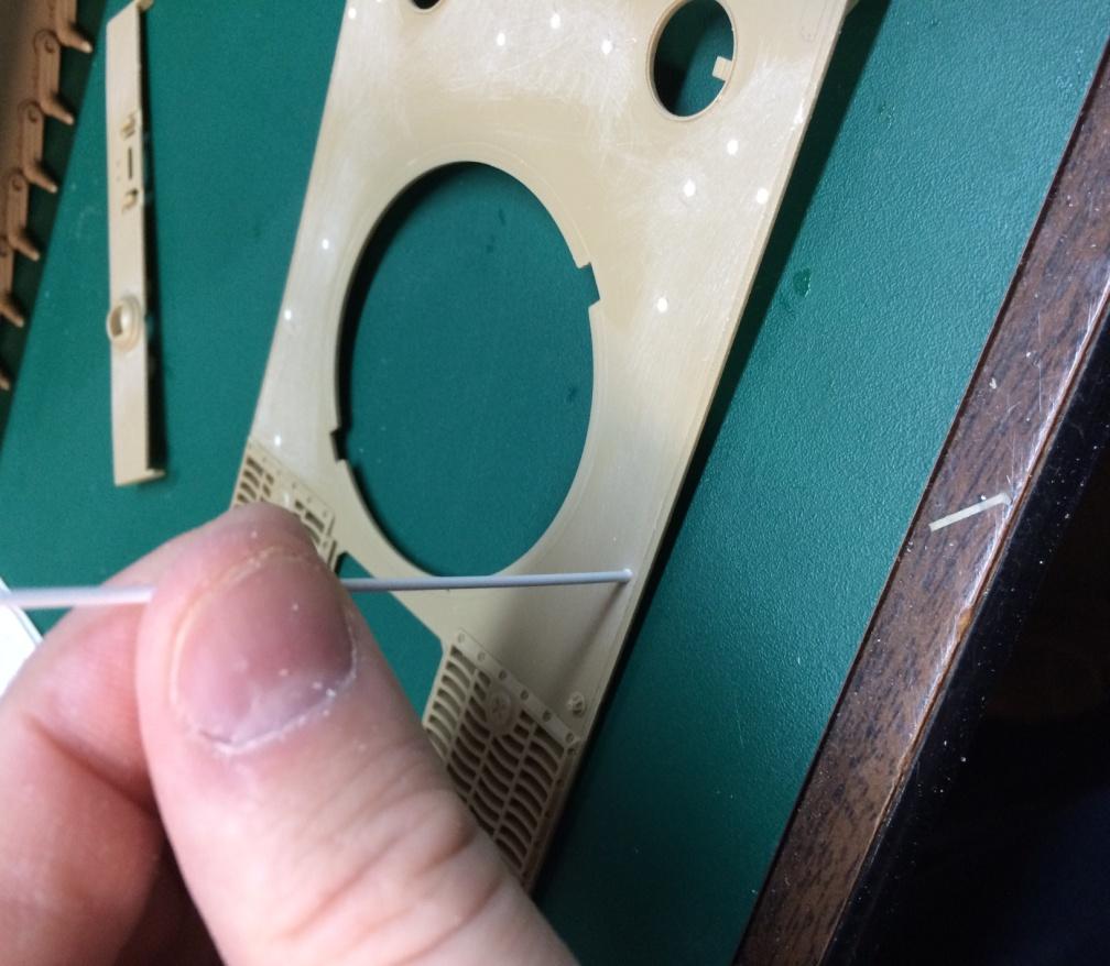 Step 2: Filling tool locator holes on the Tamiya Kit with Styrene Rod. I used Evergreen.