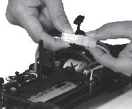 Thumb nuts are used to fasten the battery holder. Use appropriate charger to charge the included receiver battery pack.