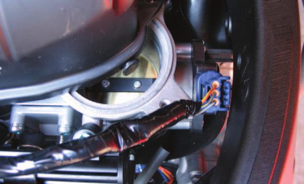 FIG.D 8 Locate the Throttle Position Sensor on the right side of the throttle bodies (Fig. D).