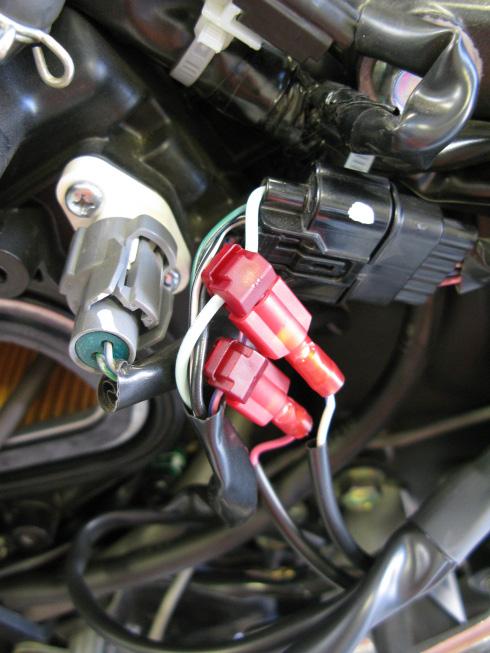 motorcycle. 3. Locate the large black factory connector containing both the speed sensor and neutral sensor wires, just below where the subframe bolts to the frame.