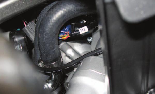 10 Unplug the TPS connector and plug the wires from the PCV in-line of the stock wiring harness and throttle body.