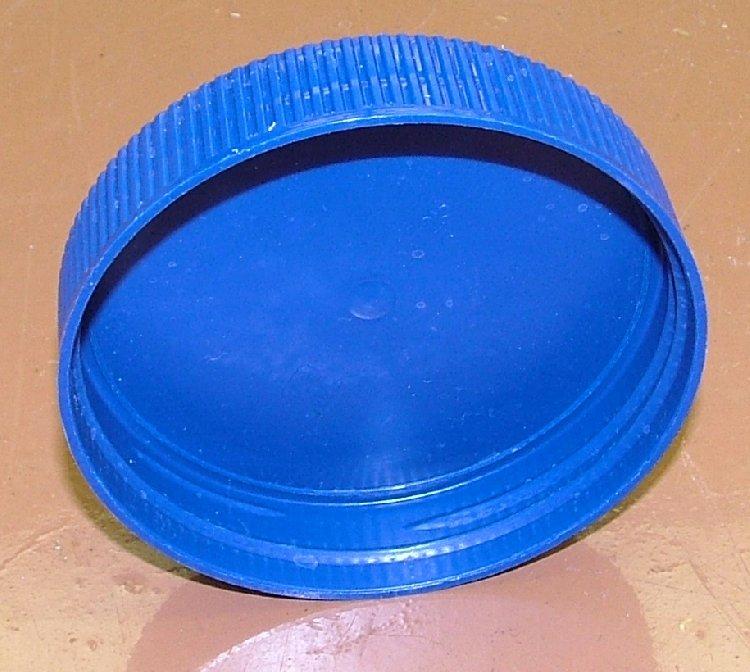 Wheels (do two times) Figure 17. A peanut butter jar lid makes the perfect wheel for a CheapBot robot. Look at a lid and you ll see there is a dimple in its center.