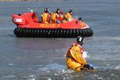 water to blocks of ice. By propelling itself faster over the ice then a normal boat can travel through it, the hovercraft far surpasses the speed at which an ice based rescue can be conducted.