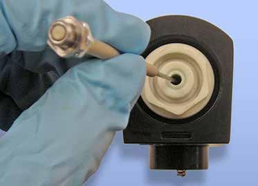 air valve adjustment nut and jam nut onto the needle shaft: The air valve adjustment nut should