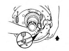 Figure 26 Cam Roller Installation 4. Push the cam roller retainer into the brake shoe until its "ears" lock in the shoe web holes.
