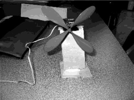 WIND POWER (2005;2) Jill is making a model wind turbine. It includes a generator constructed from a strong horseshoe magnet and a coil of wire, with 500 turns.