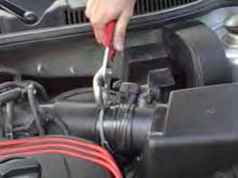 Step 4: Using a pair of pliers, remove the clamp that connects the mass air sensor to the induction hose that leads to the engine.