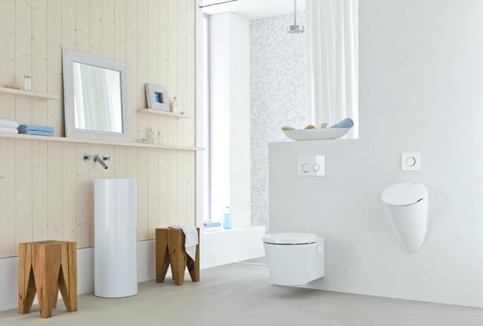 Flawless coordination. Geberit design family. Toilet and urinal flush control actuation featuring a coordinated design: the result is a single design thread running through the whole bathroom.